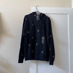 Black Nike Sweatshirt w/ gold Nike Symbol